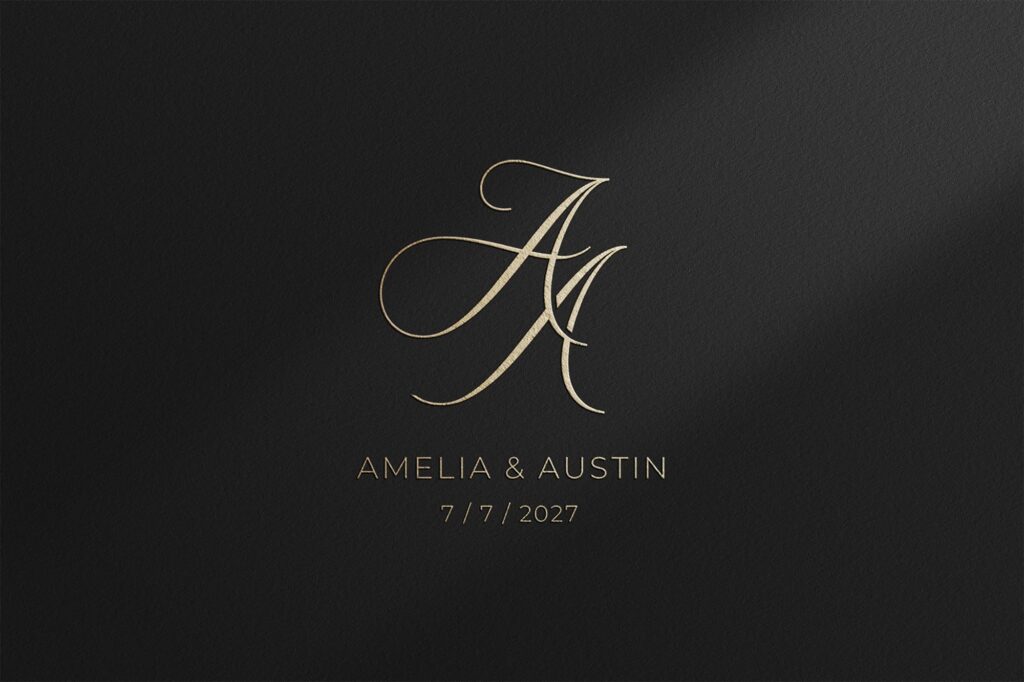 Calligraphy wedding monogram on black background with gold foil effect